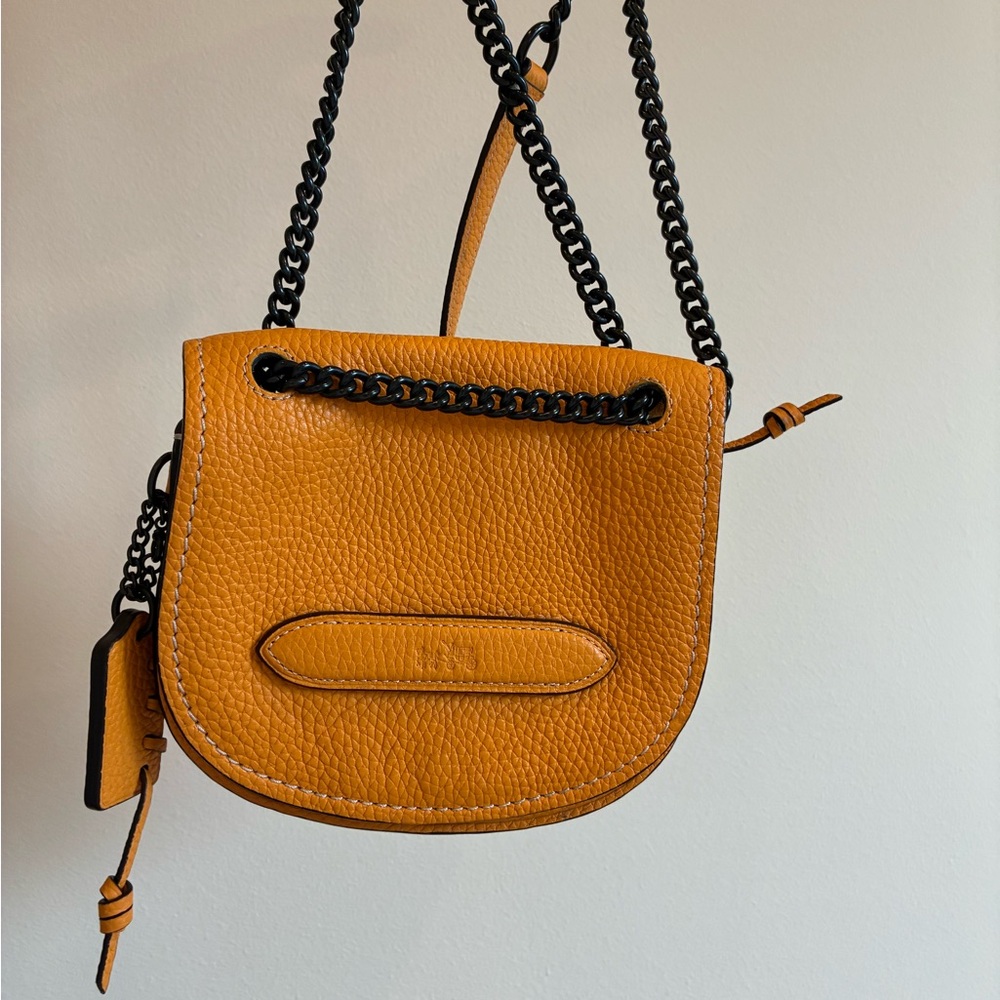 Coach Yellow Small Shadow Crossbody Bag Pebbled Leather with a chain strap.